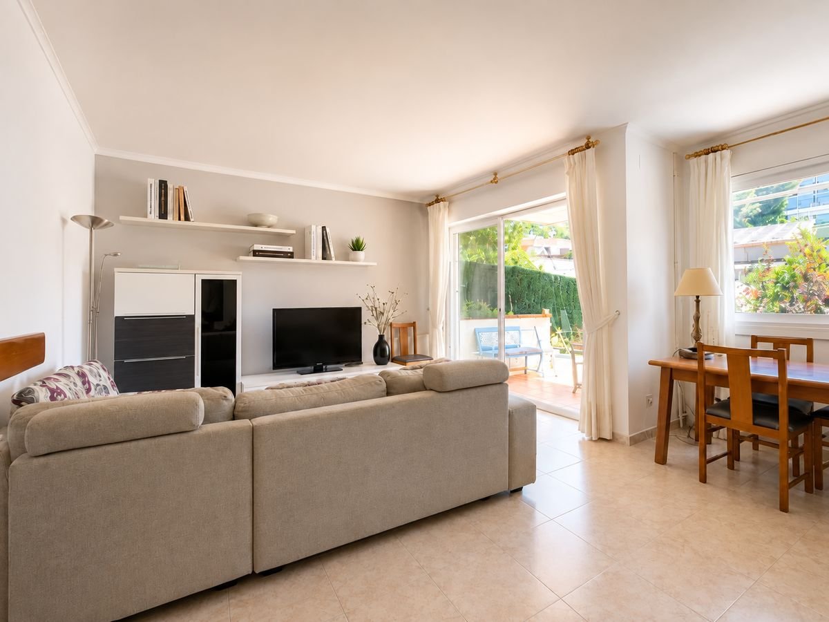 Living and dining room opening onto the terrace
